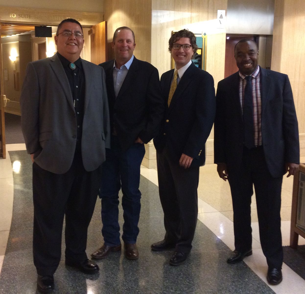 Left to right: Michael Sage, GGEDC; Roger Montano, Gallup Pipeline & Compliance Services; Mark Horn, Pinnacle Bank; John Brooks, NMFA