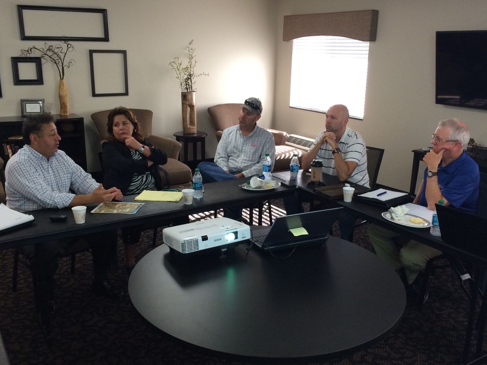 Group receives briefing by NM IBA: Left to right: Jerry Pacheco, NM IBA; Patty Lundstrom, GGEDC; Rick Murphy, GGEDC; Aaron Kowalski, Gallup Land Partners; Jeff Kiely, NWNMCOG